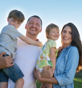 Theyre our greatest source of joy. Portrait of a happy family bonding together outdoors